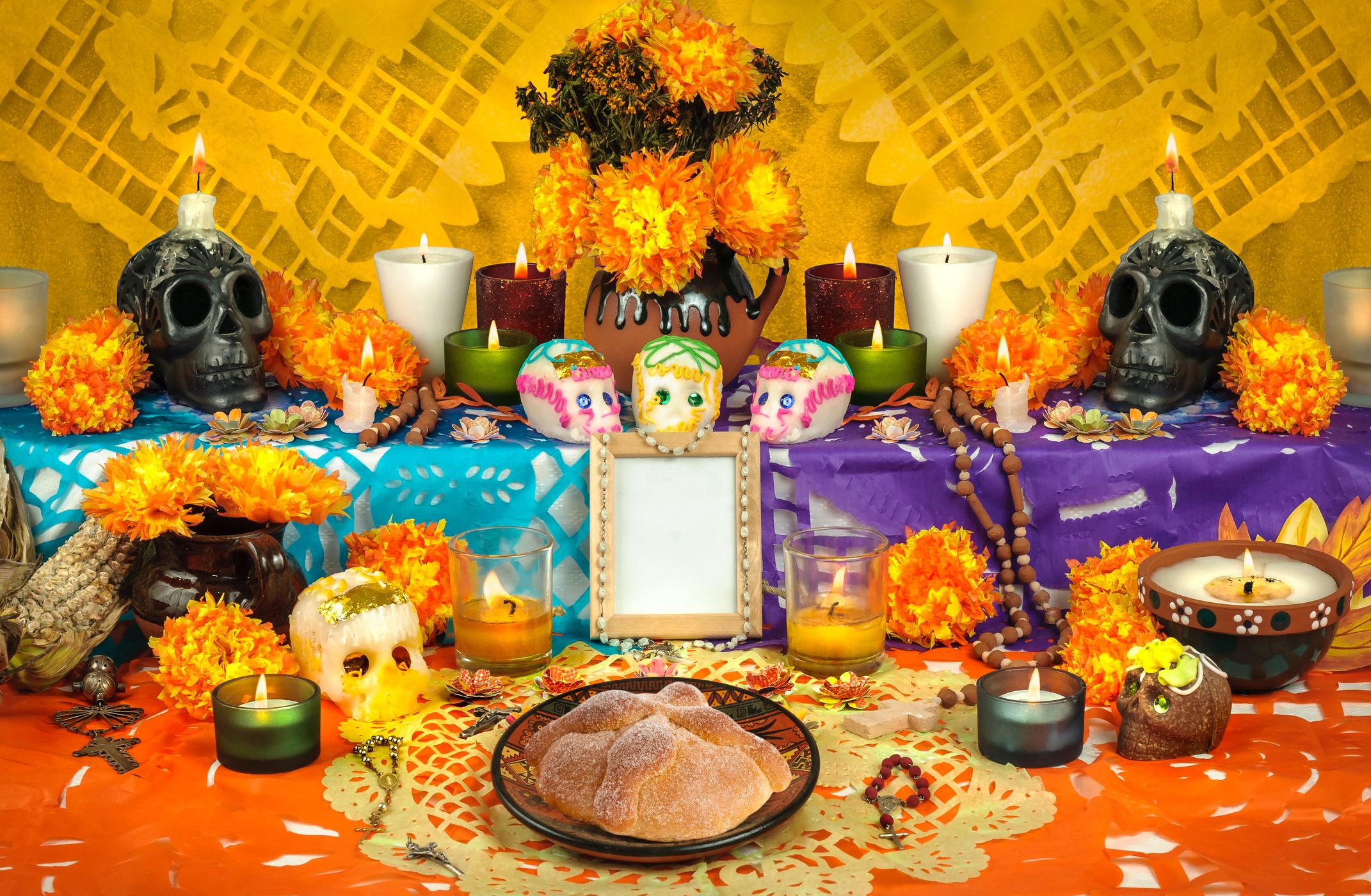 A Table With Food And Candles